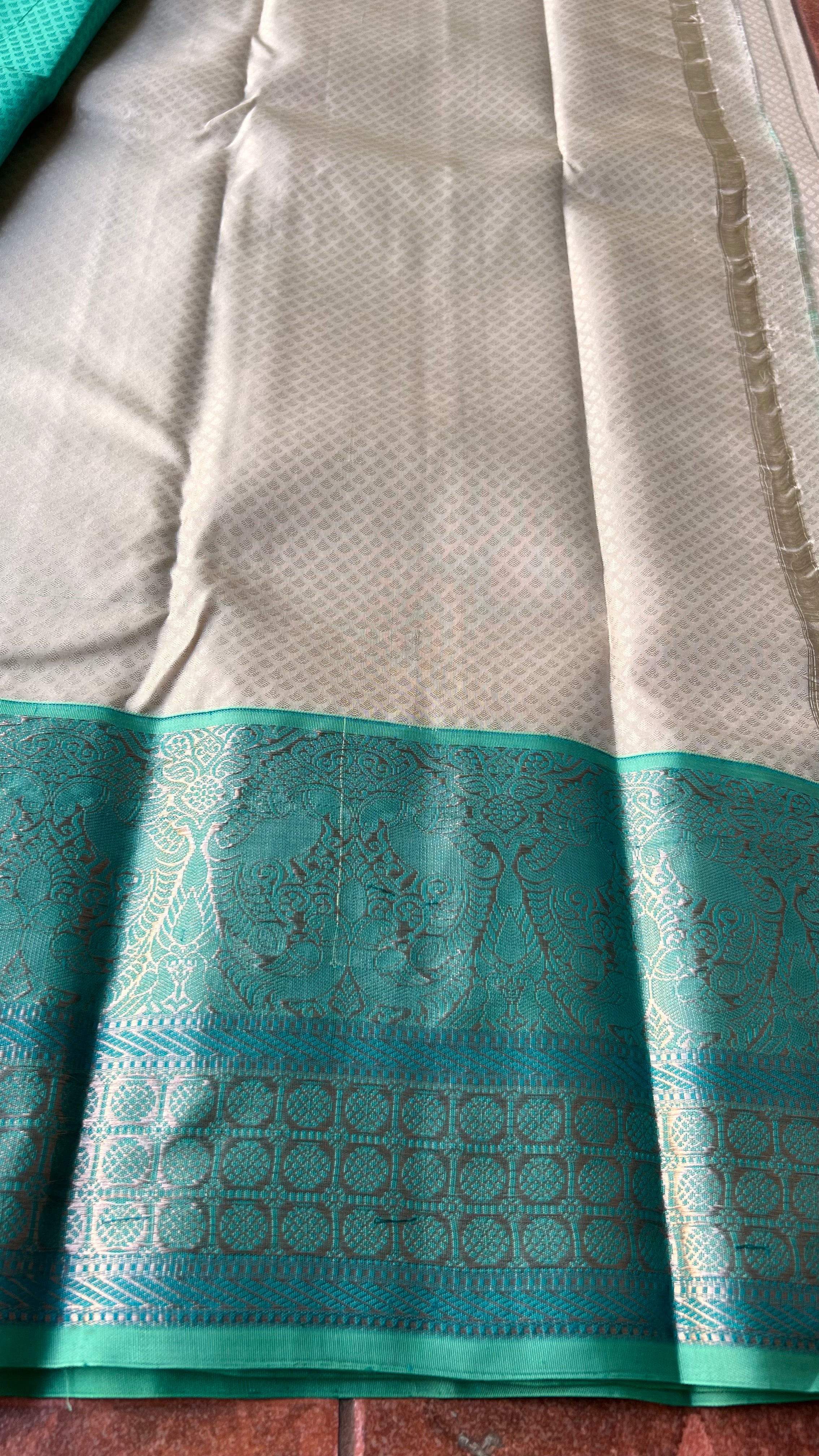 Half white and sea green kanjivaram silk saree with blouse - Threads