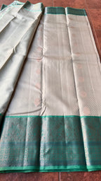 Half white and sea green kanjivaram silk saree with blouse - Threads