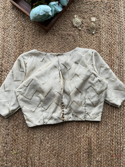 Half white silk hand work blouse