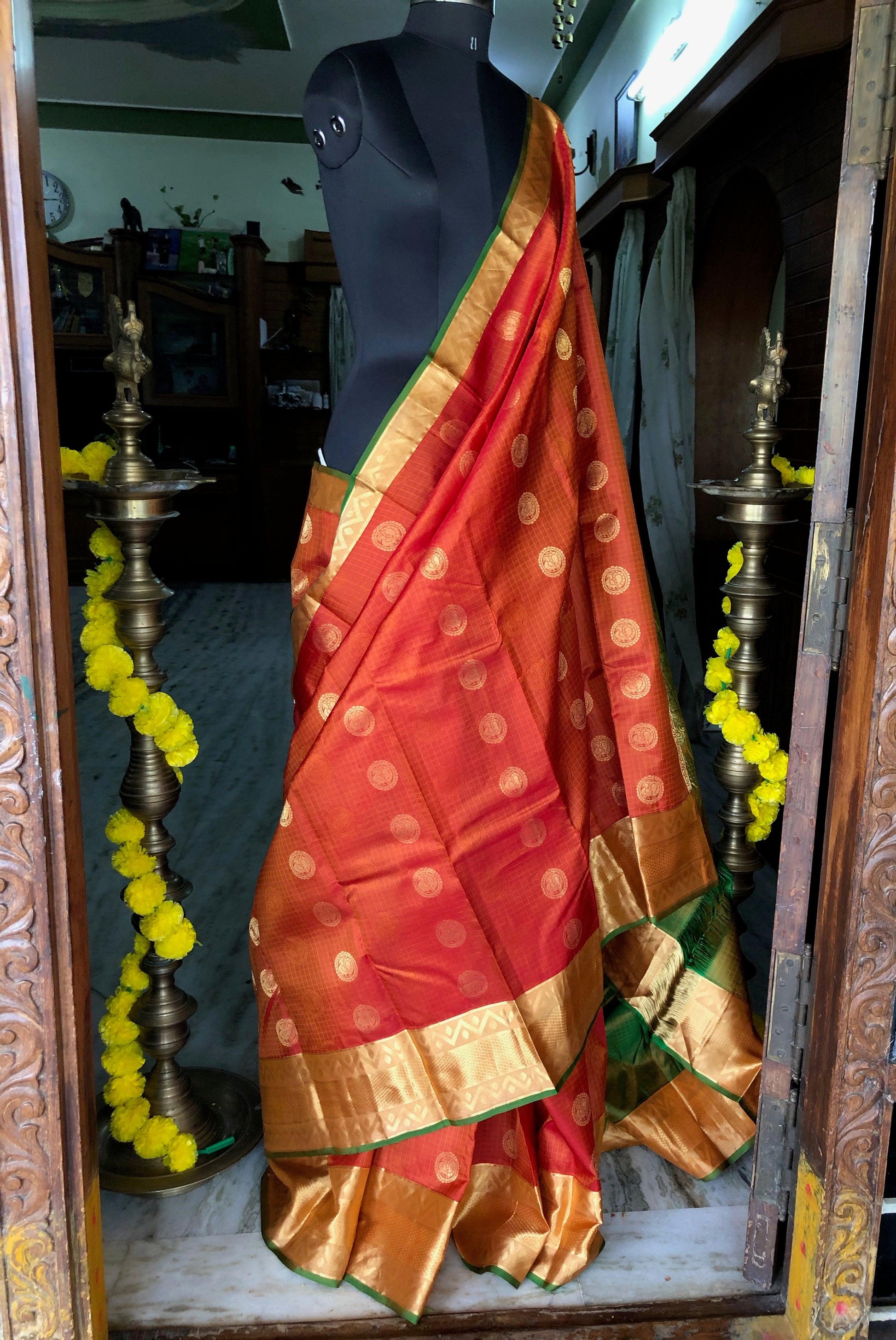 Kanjipuram Silk Jaal Orange bridal saree - Threads
