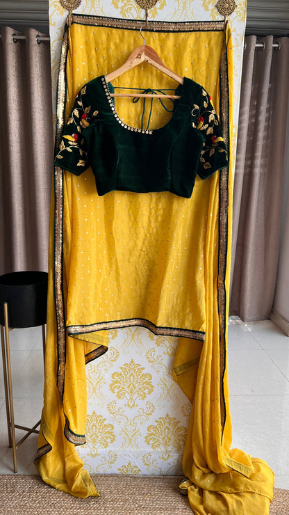 Yellow chinnon saree with green hand worked blouse - Threads