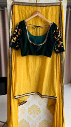 Yellow chinnon saree with green hand worked blouse - Threads
