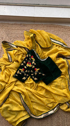 Yellow chinnon saree with green hand worked blouse - Threads
