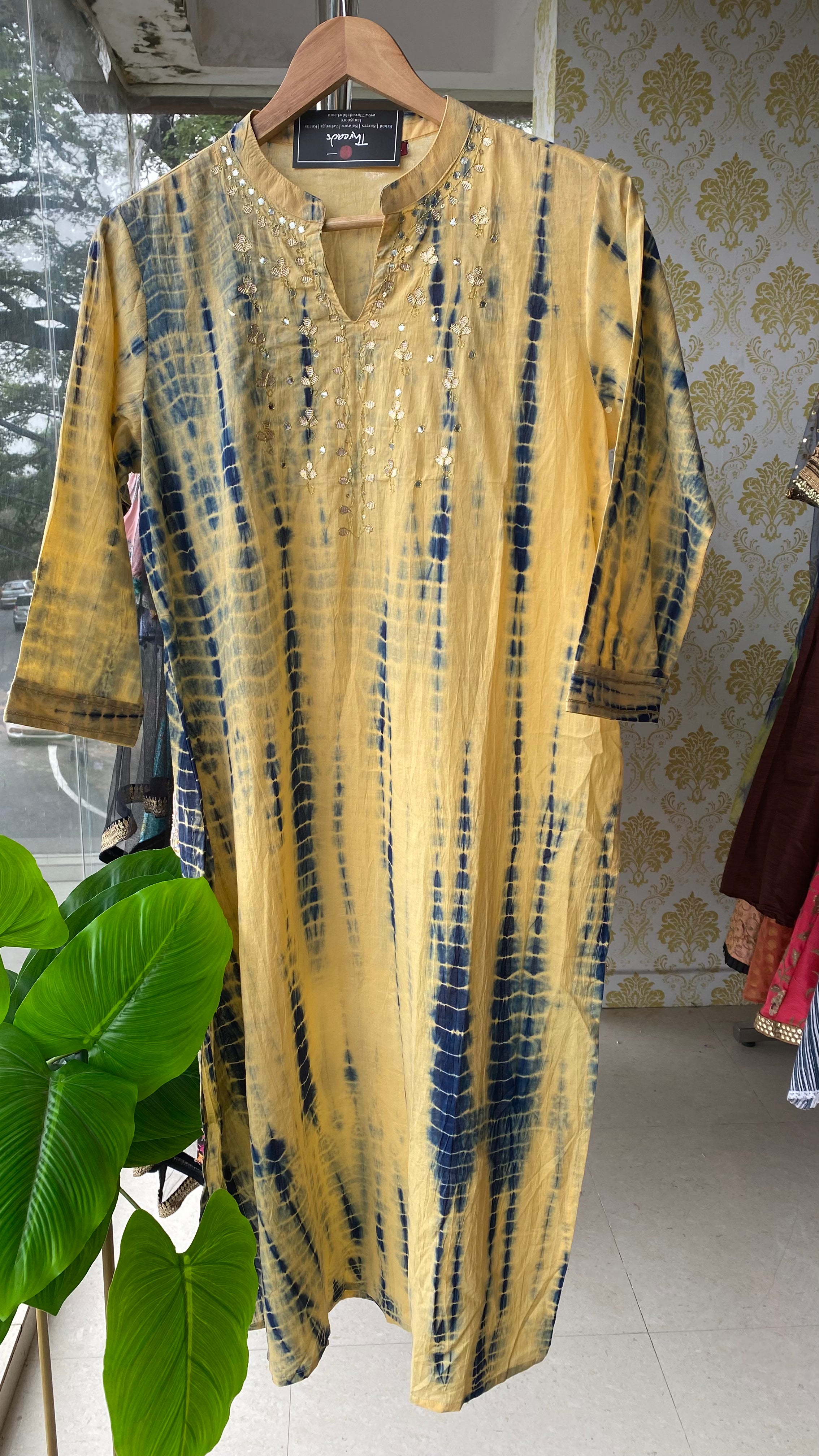 Cream and blue embroidery hand worked kurti top - Threads