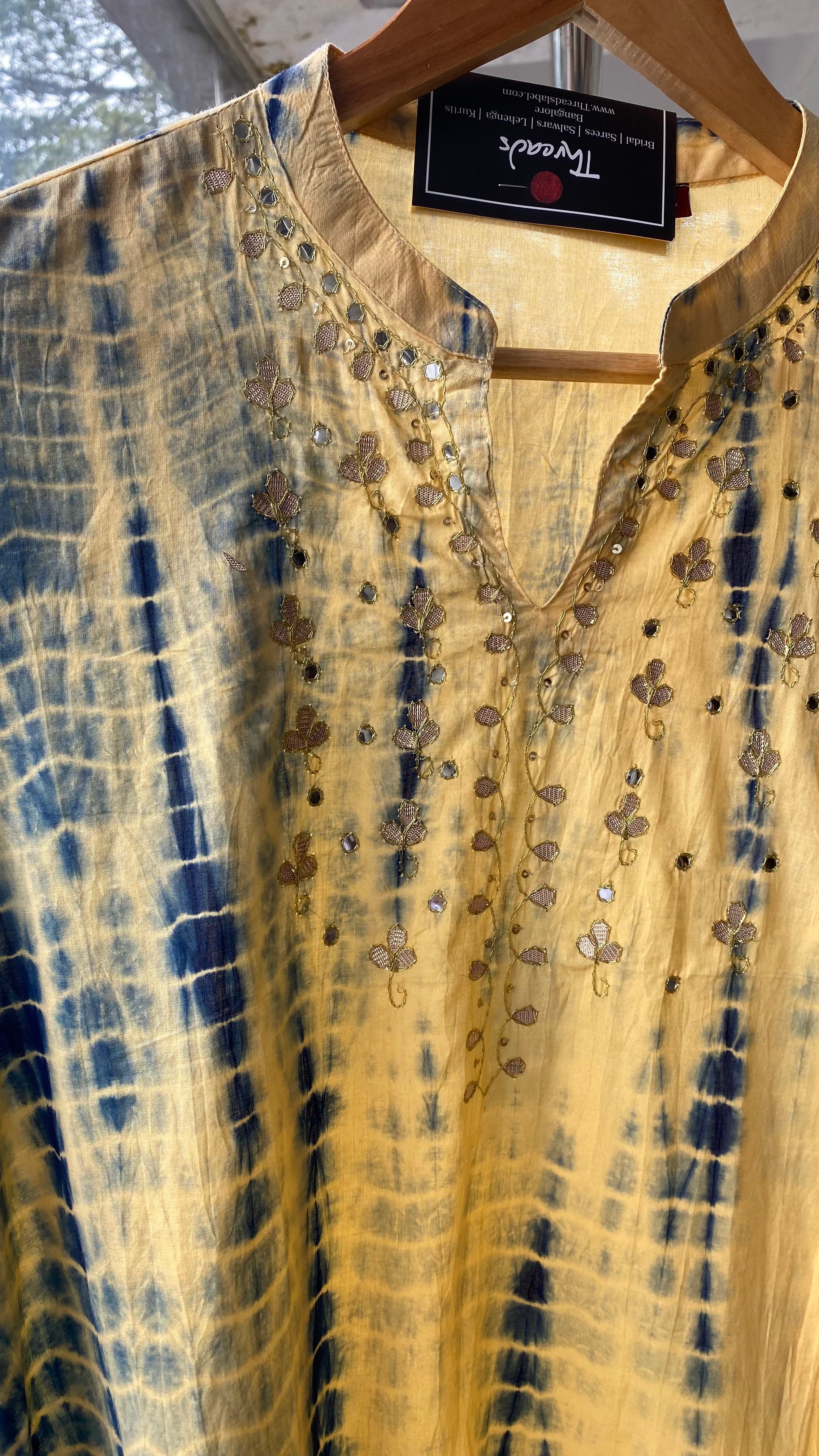 Cream and blue embroidery hand worked kurti top - Threads