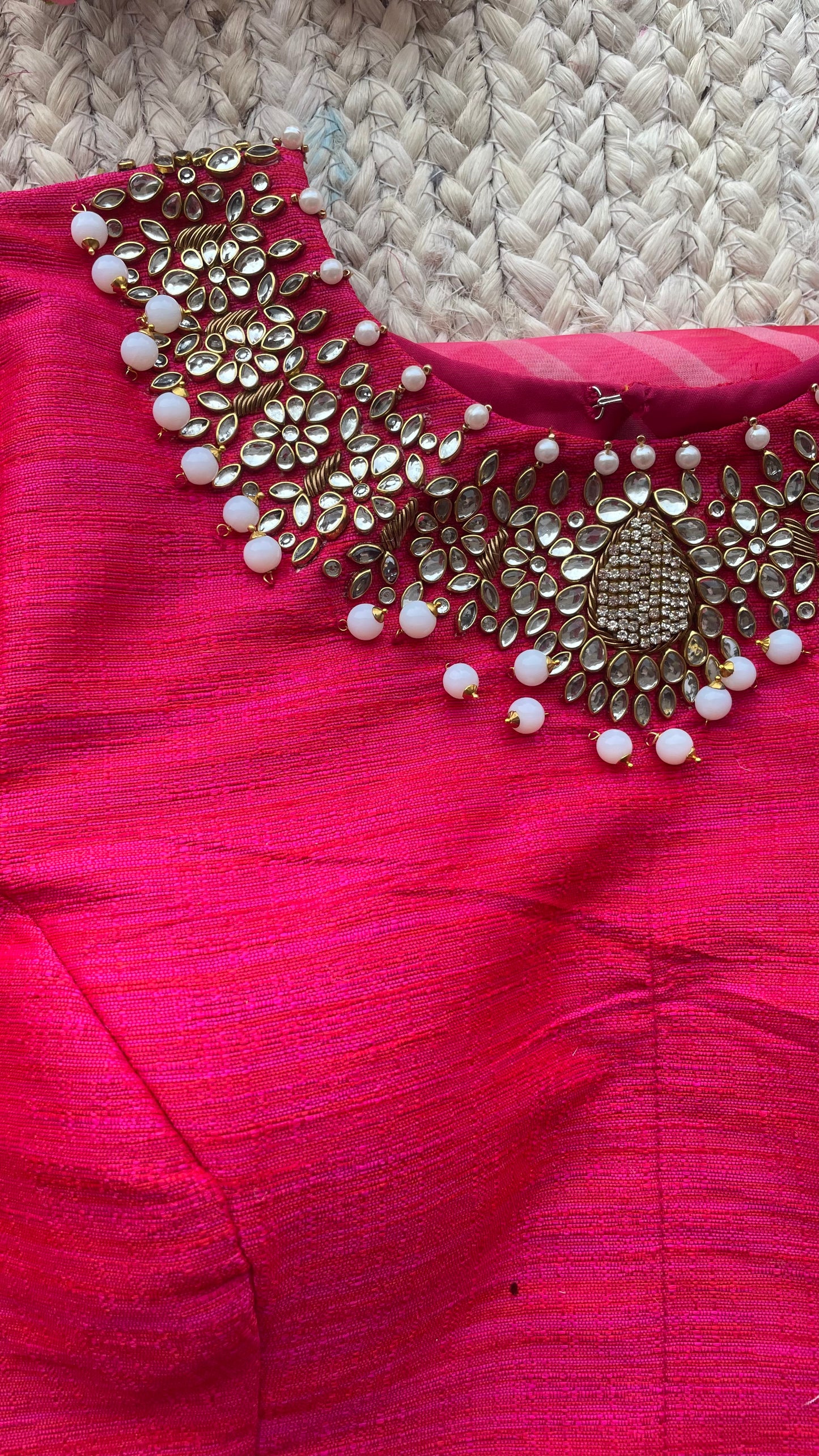 Pink organza saree with jewel neck pink blouse