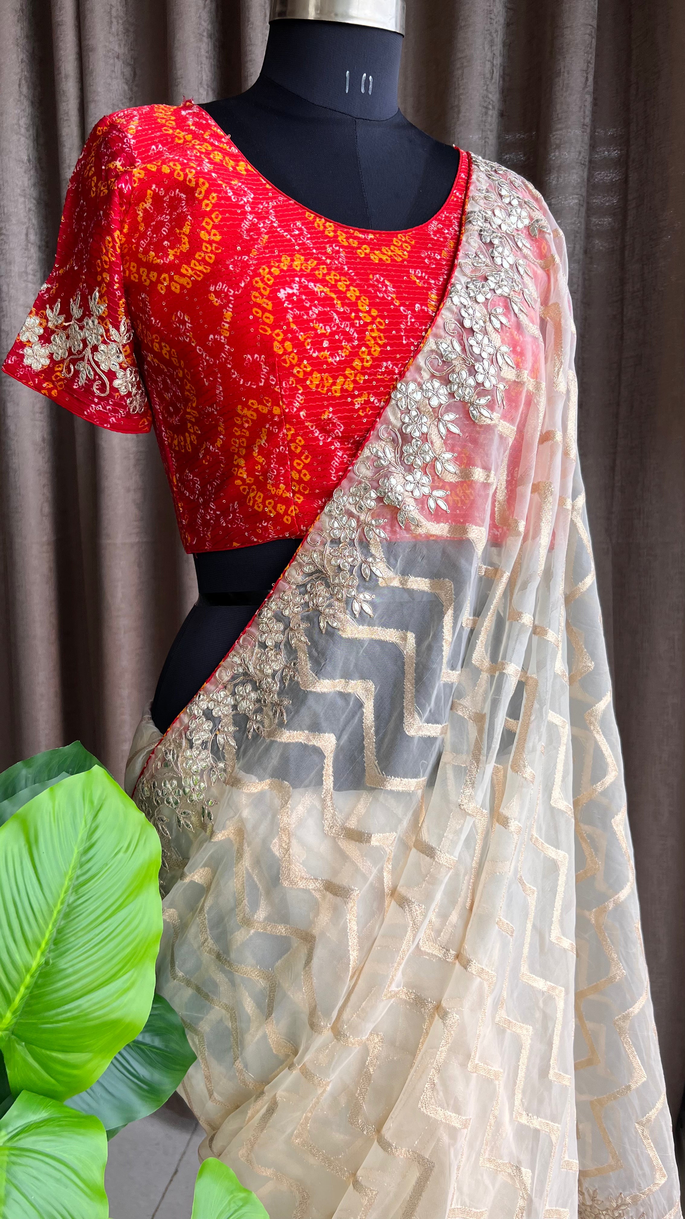 Cream organza saree with chiffon embroidery blouse - Threads