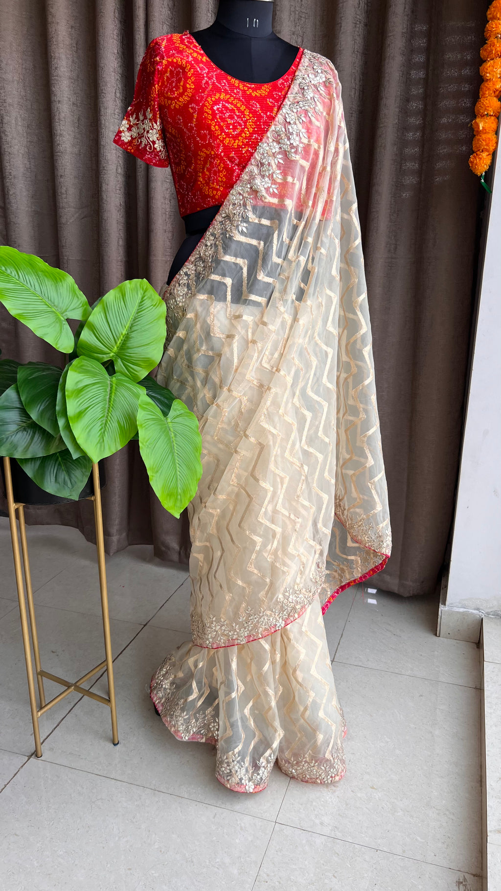 Cream organza saree with chiffon embroidery blouse - Threads