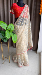 Cream organza saree with chiffon embroidery blouse - Threads