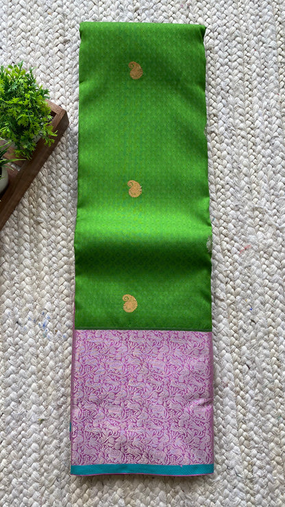 Green and pink kanchipuram silk saree with blouse