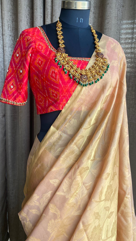 Golden cream kanchipuram silk saree with hand worked blouse
