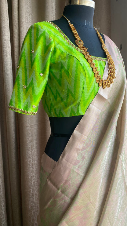 Cream white kanchipuram silk saree with hand worked blouse