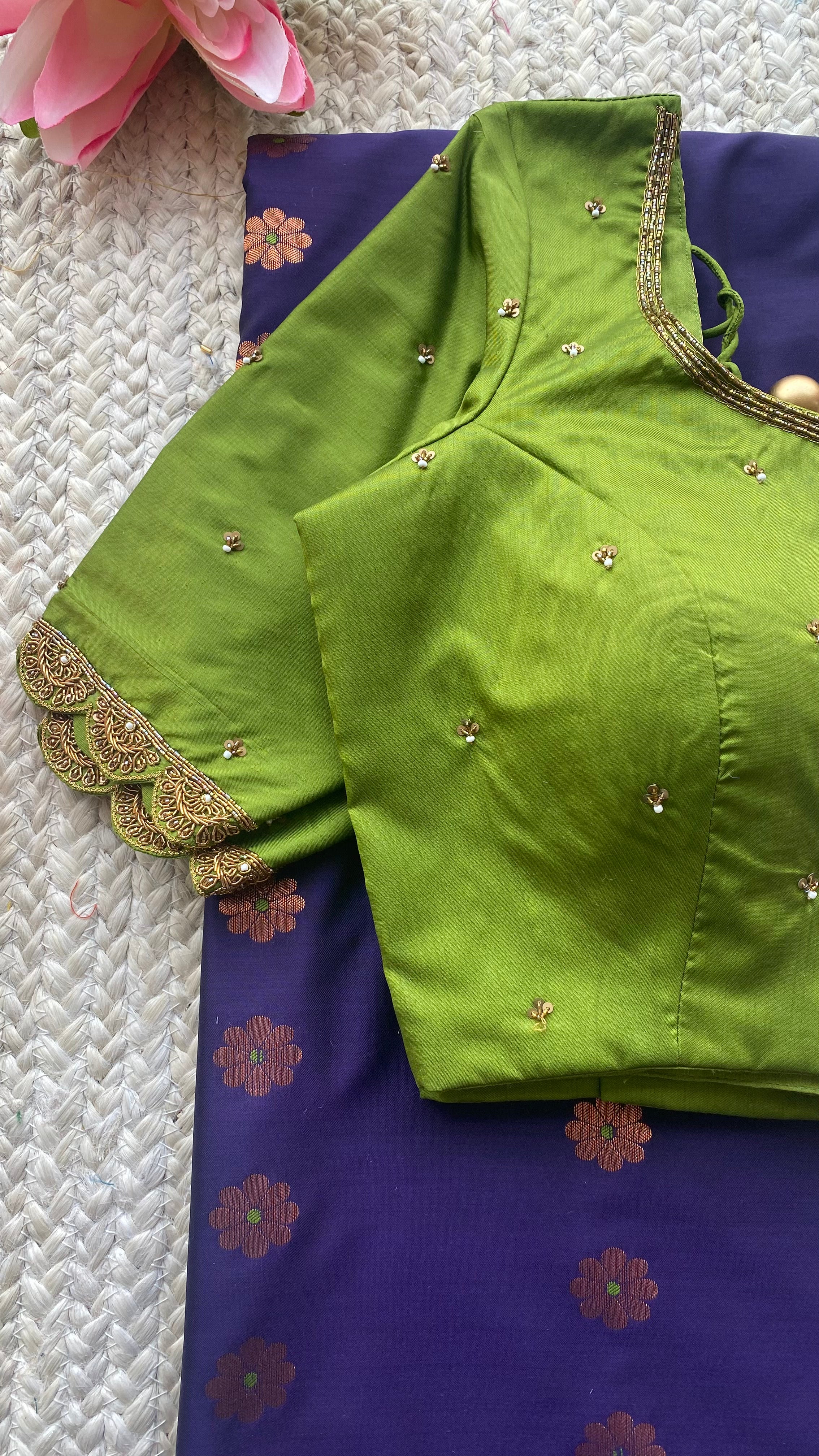 Blue silk saree with green hand worked blouse