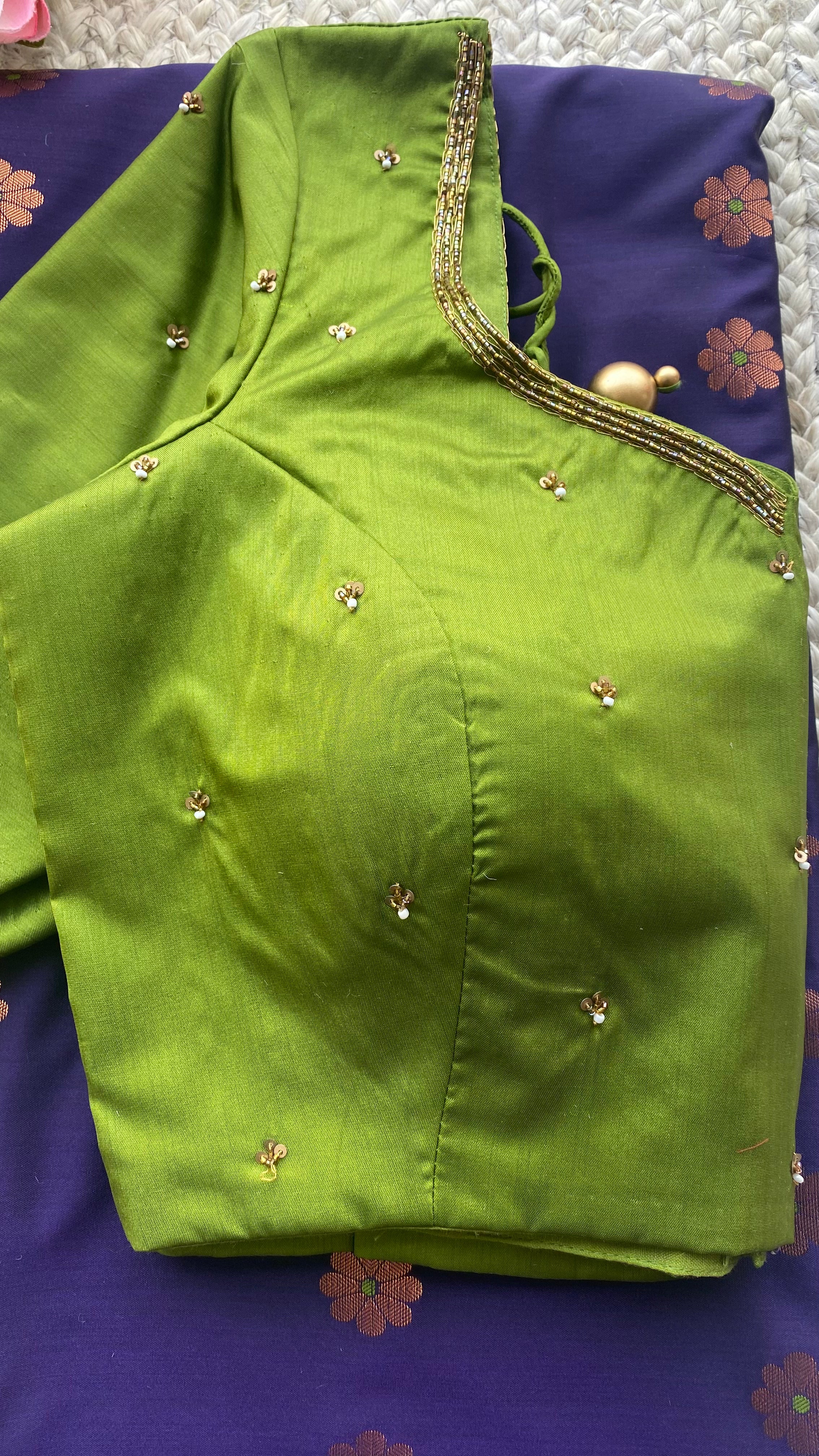 Blue silk saree with green hand worked blouse