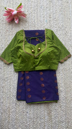 Blue silk saree with green hand worked blouse
