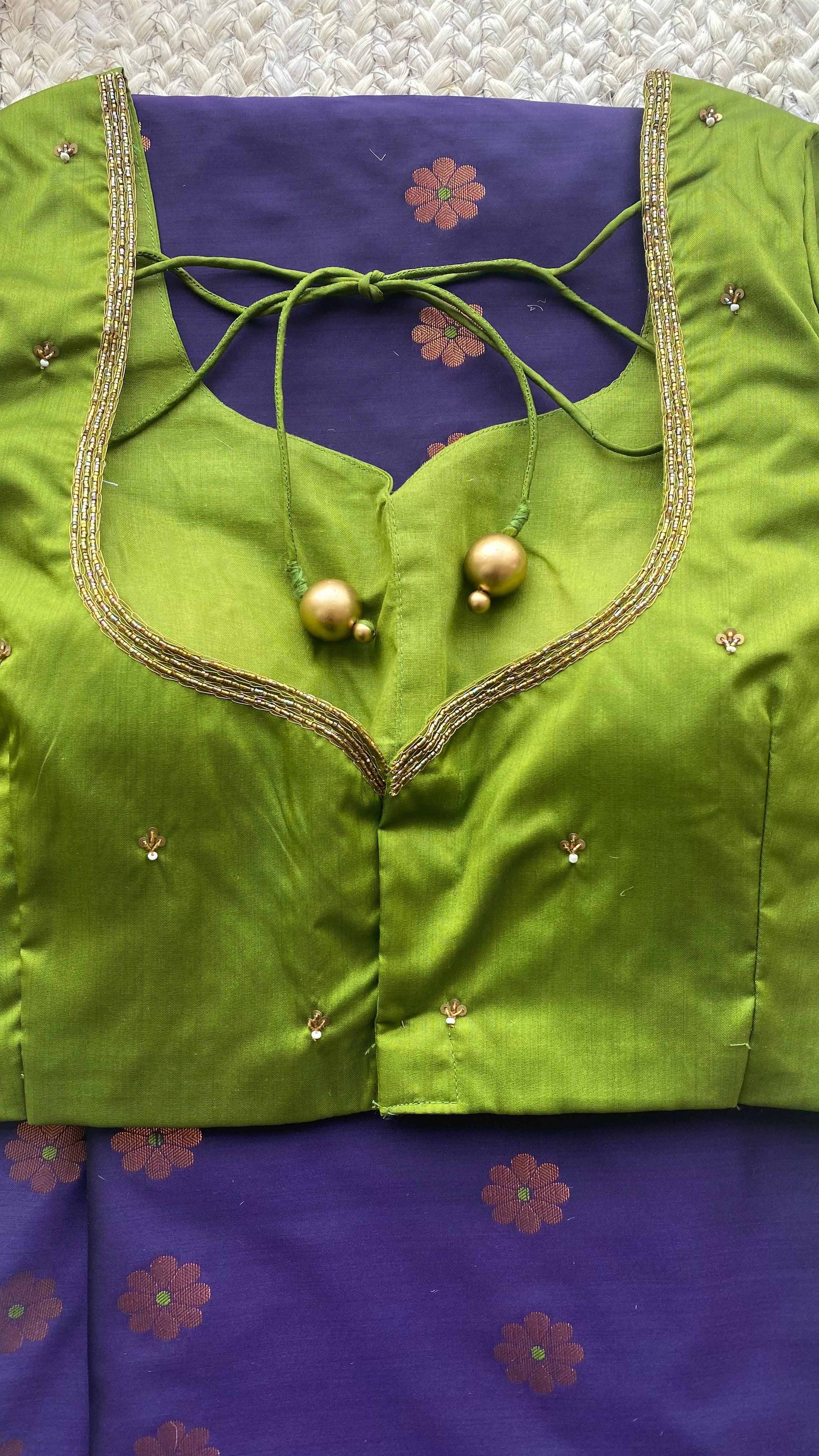 Blue silk saree with green hand worked blouse