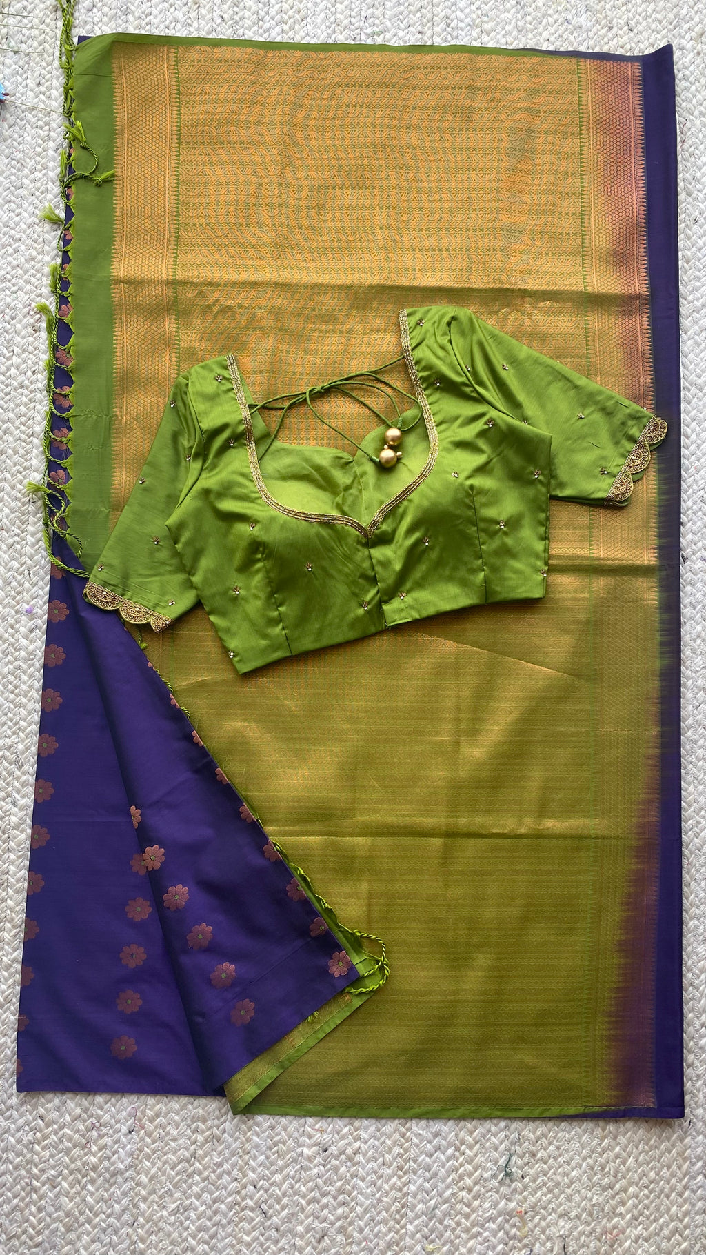 Blue silk saree with green hand worked blouse