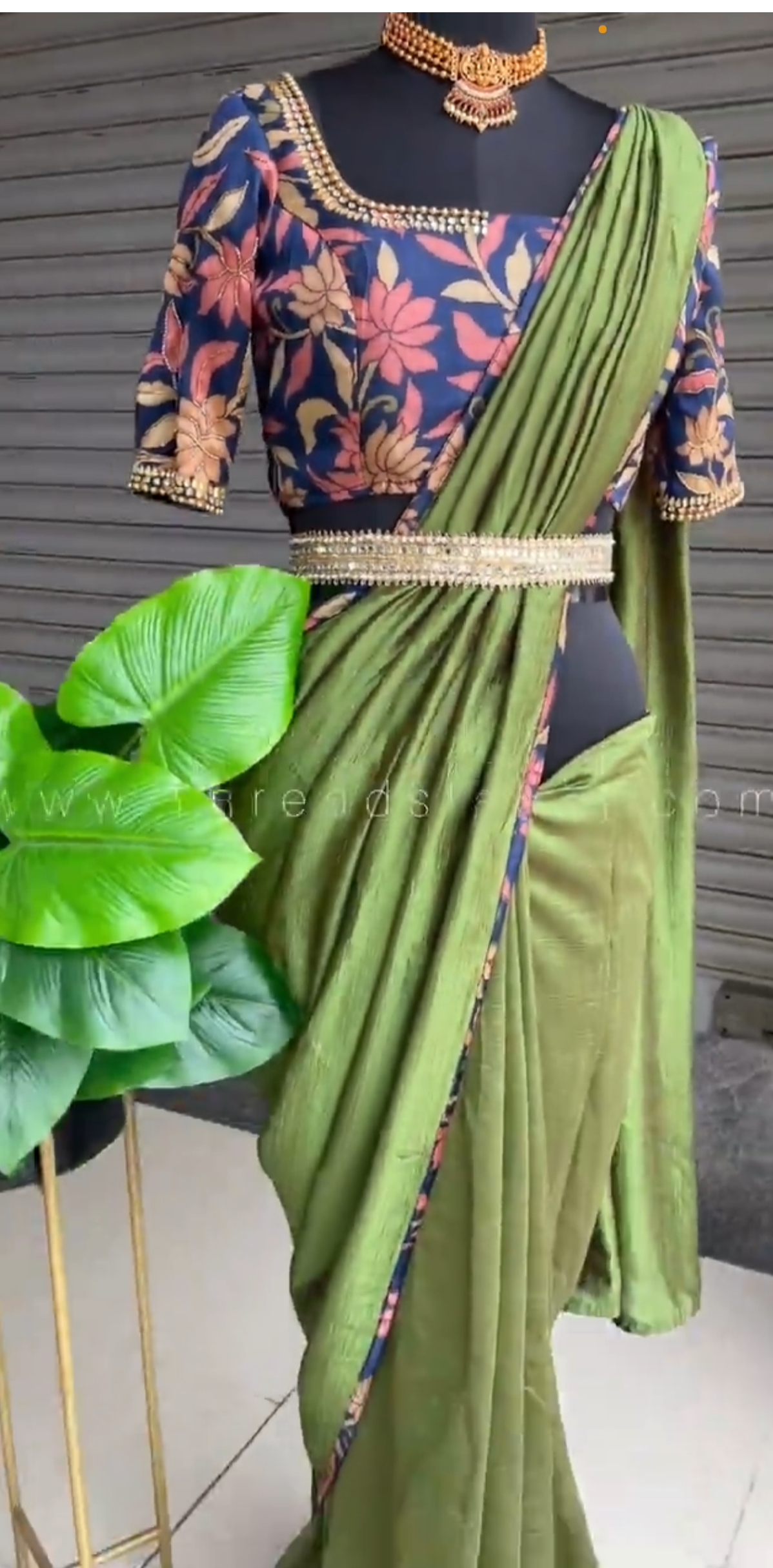 Bottle green silk saree with hand worked kalamkari blouse