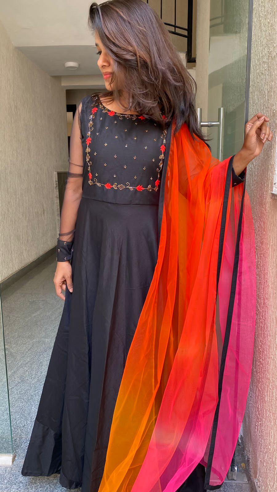Black rose silk salwar suit of hand worked top and a red Duppata - Threads