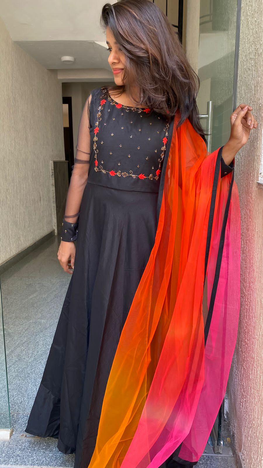 Black rose silk salwar suit of hand worked top and a red Duppata - Threads