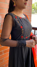 Black rose silk salwar suit of hand worked top and a red Duppata - Threads