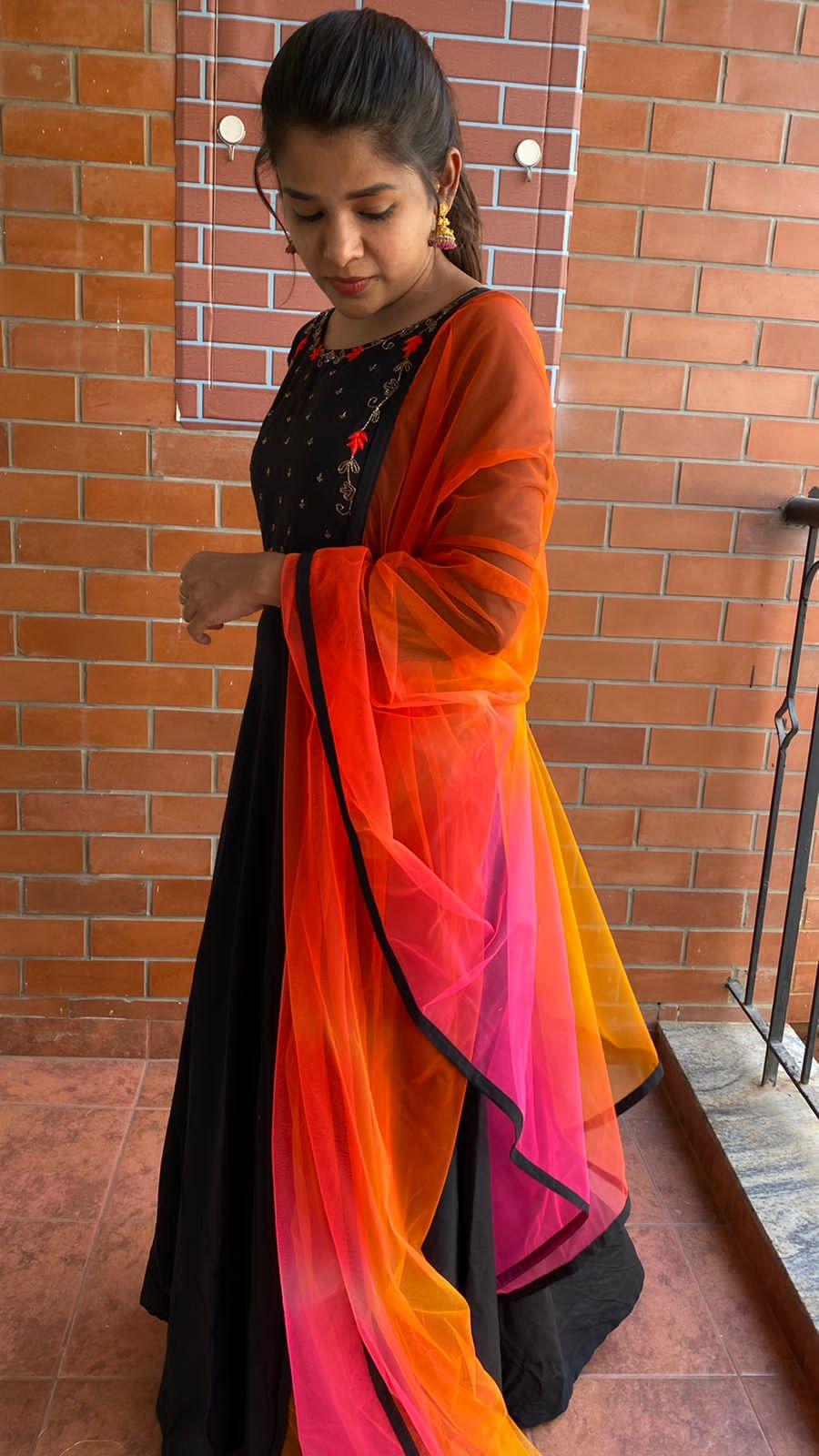 Black rose silk salwar suit of hand worked top and a red Duppata - Threads