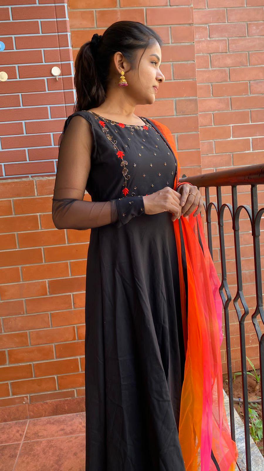 Black rose silk salwar suit of hand worked top and a red Duppata - Threads