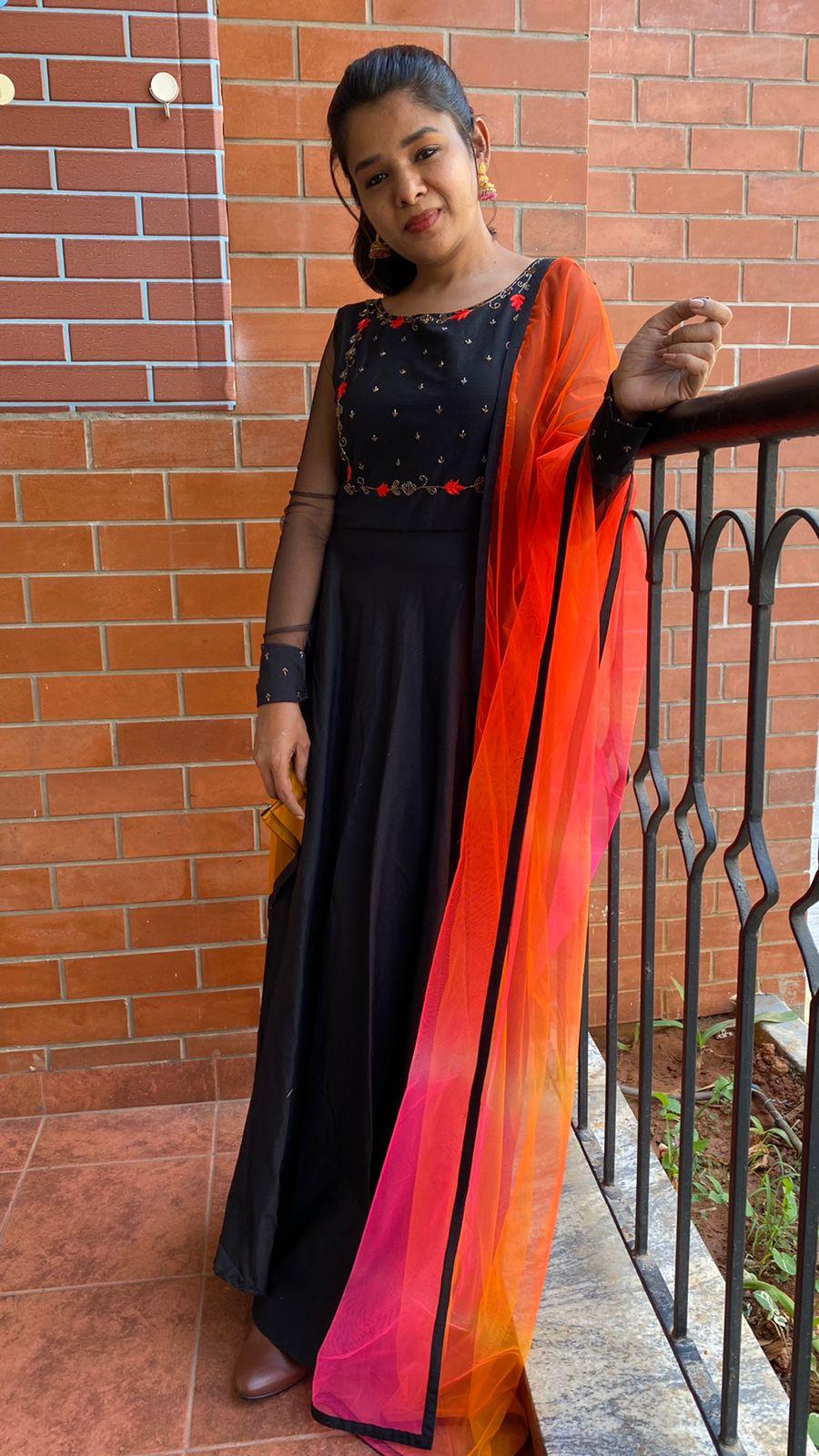 Black rose silk salwar suit of hand worked top and a red Duppata - Threads