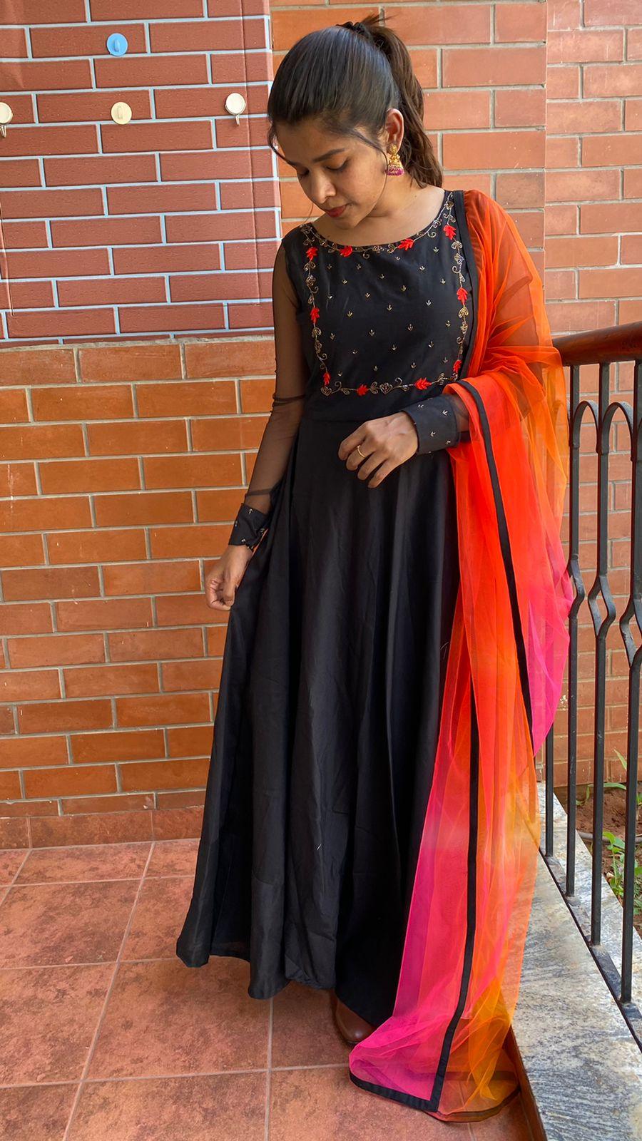 Black rose silk salwar suit of hand worked top and a red Duppata - Threads