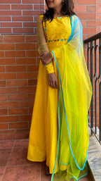 Yellow Bloom handworked top and a yellow Duppata salwar suit - Threads
