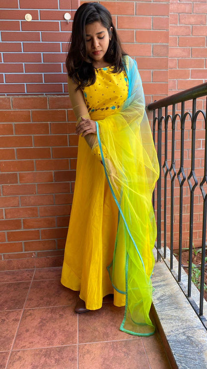 Yellow Bloom handworked top and a yellow Duppata salwar suit - Threads