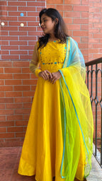 Yellow Bloom handworked top and a yellow Duppata salwar suit - Threads