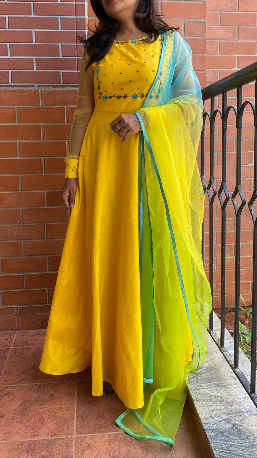 Yellow Bloom handworked top and a yellow Duppata salwar suit - Threads