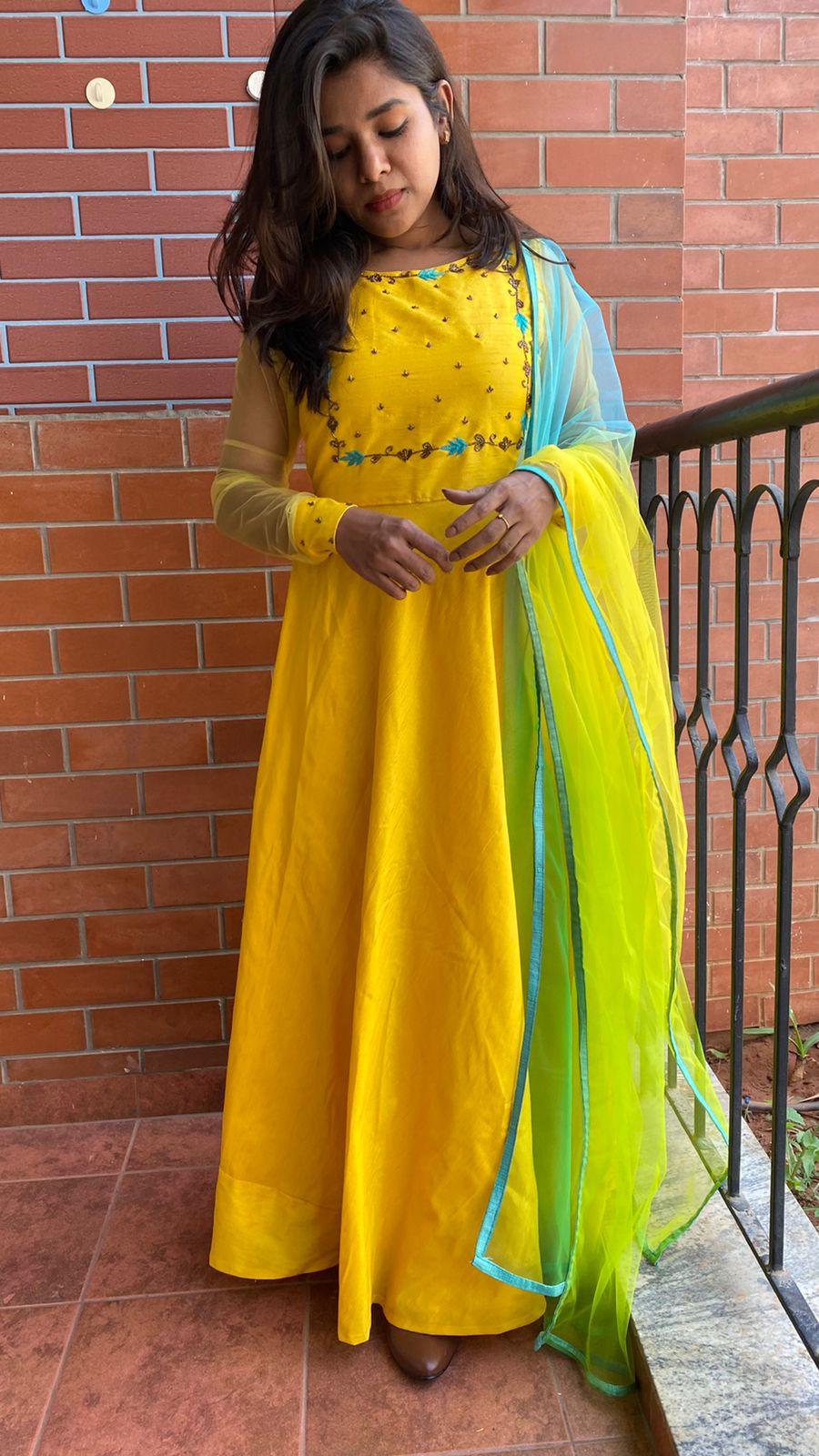 Yellow Bloom handworked top and a yellow Duppata salwar suit - Threads