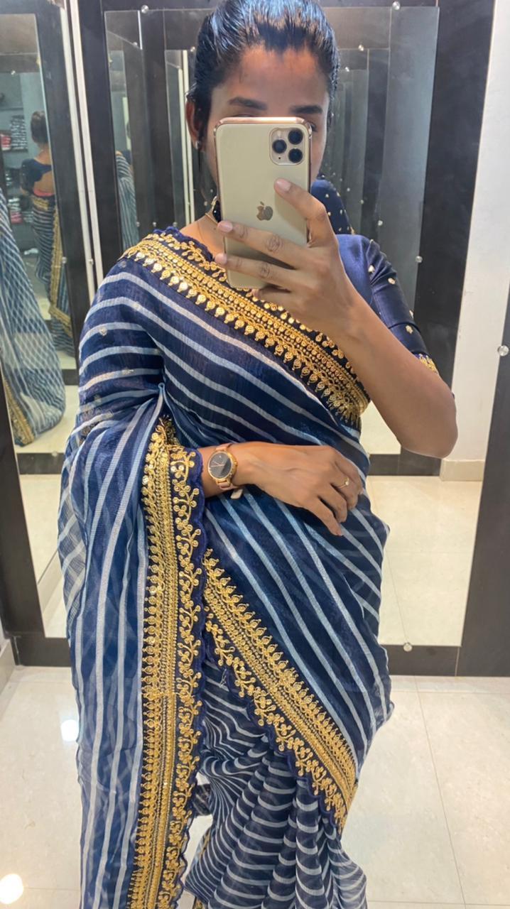 Blue organza embroidery border  saree with unstitched blouse - Threads