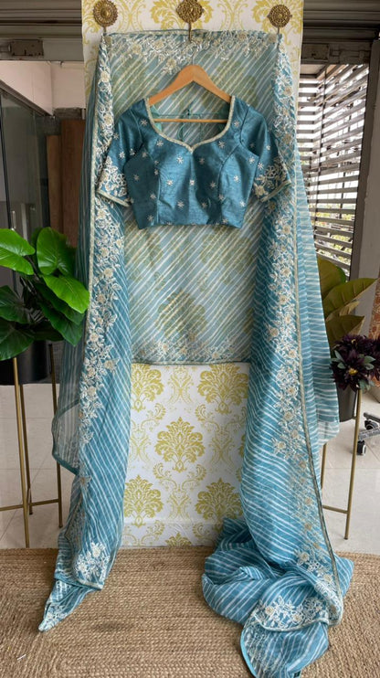 Lehariya Blue organza saree with blue hand worked blouse - Threads