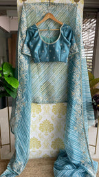 Lehariya Blue organza saree with blue hand worked blouse - Threads