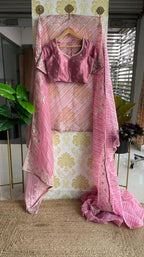 Lehariya pink organza saree with blue hand worked blouse - Threads