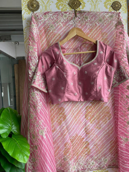 Lehariya pink organza saree with blue hand worked blouse - Threads