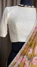 Fenu greek floral organza saree with half white embroidery blouse