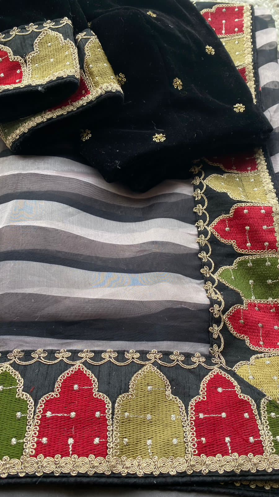 Black and white organza saree with embroidered blouse