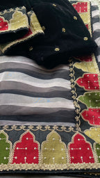 Black and white organza saree with embroidered blouse