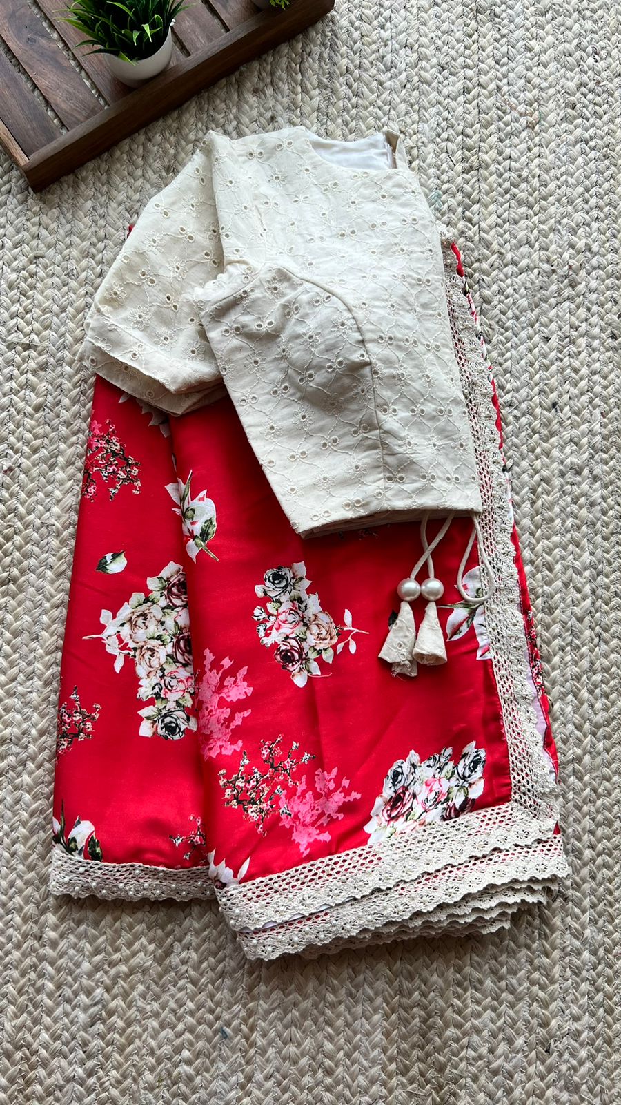Red floral satin saree with embroidery worked blouse