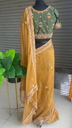 Light orange organza saree with silk embroidery blouse - Threads