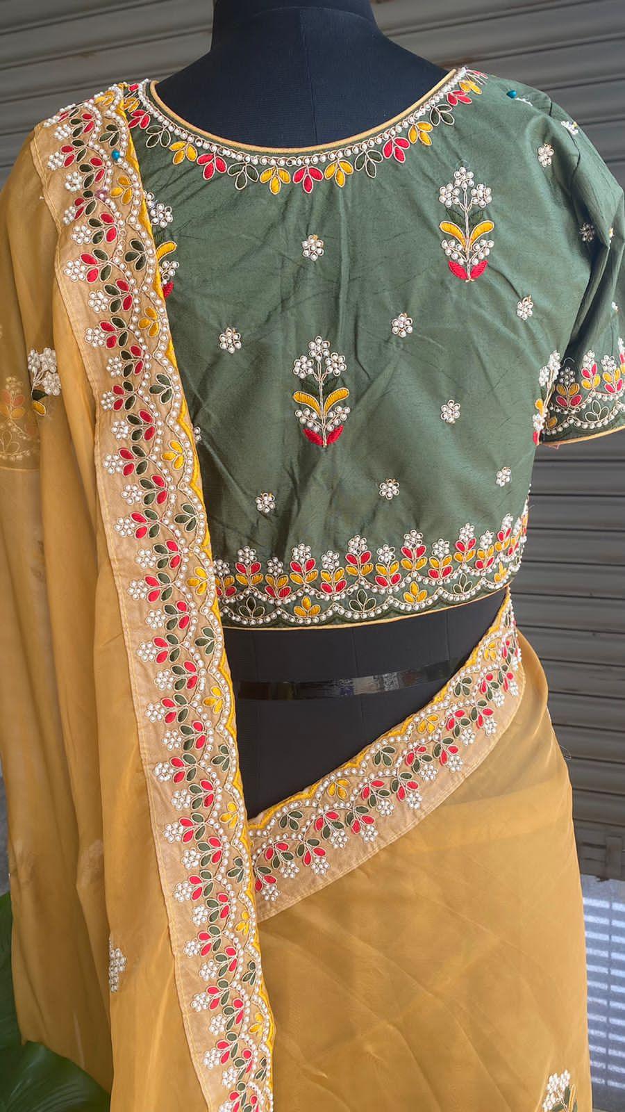 Light orange organza saree with silk embroidery blouse - Threads